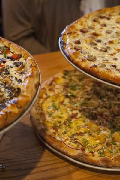 Platters of Pizza from Pies and Pints