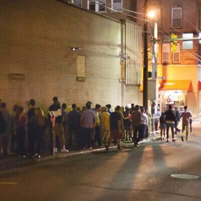 College students in line for a club in downtown Morgantown.
