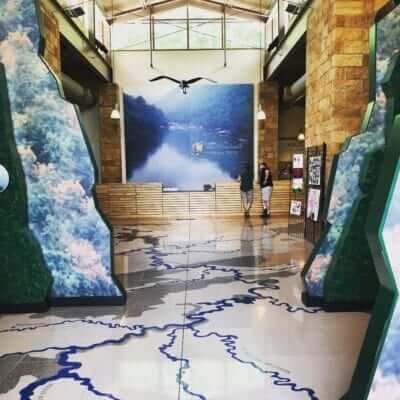 Inside of Sandstone rest stop with marble floors and beautiful scenery.
