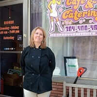 Jennifer Pettigrew Burns standing in front of Ms. Groovy's Catering