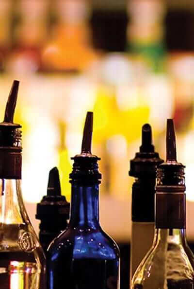 lineup of liquor bottles